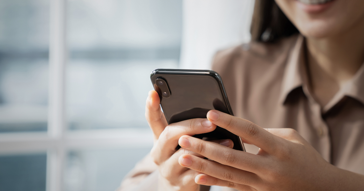 Person holding a black iPhone