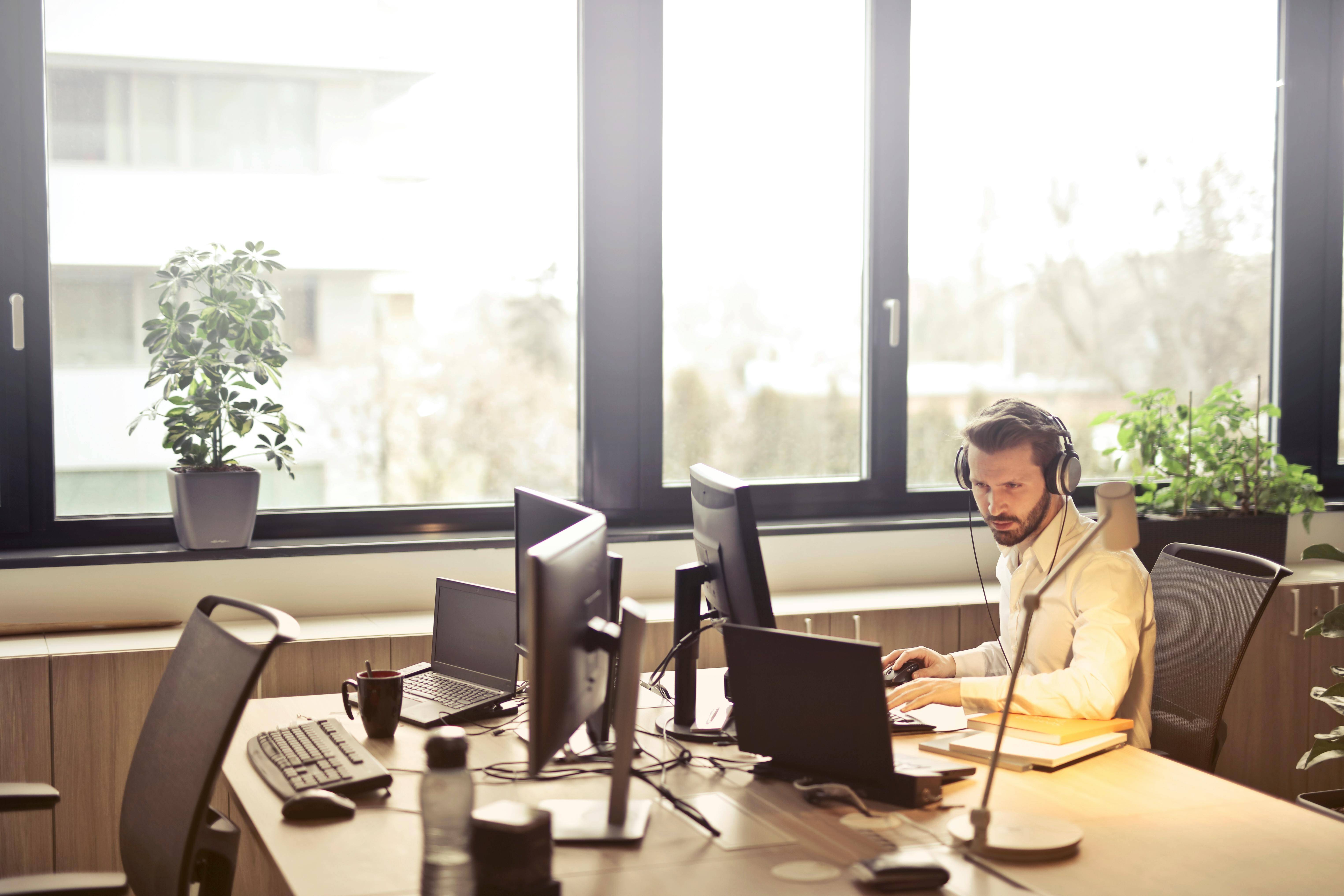 A person making cold calls at a desk